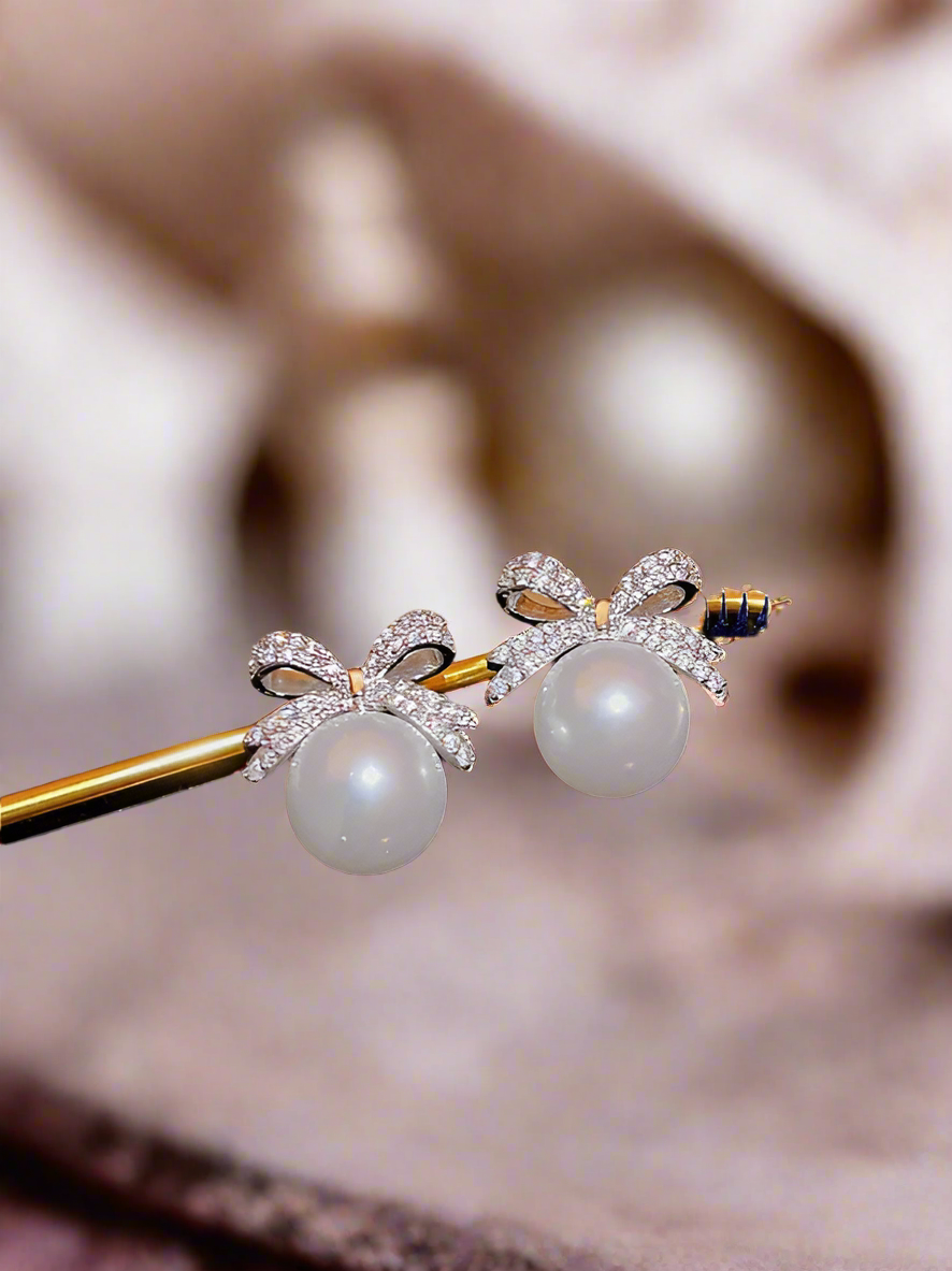 Bow Rhinestone and Faux Pearl Stud Earrings